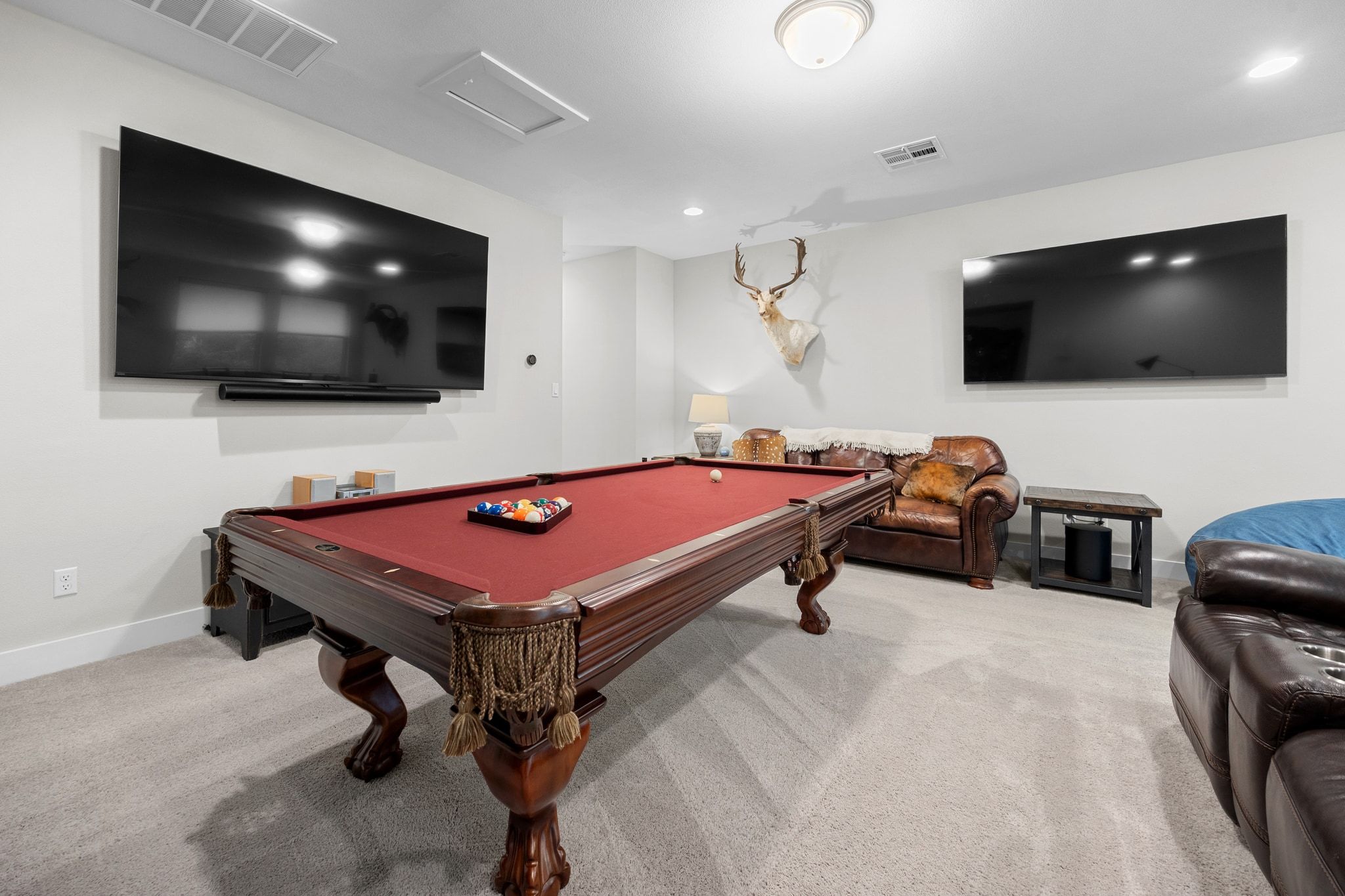 2009 Nature View Loop Driftwood, TX 78619 - Photo 21 of 40 a living room with furniture and a flat screen tv