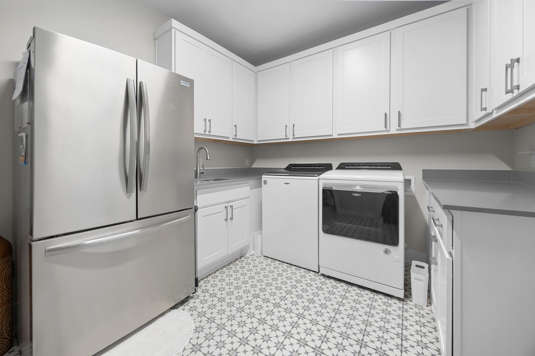 2009 Nature View Loop Driftwood, TX 78619 - Photo 26 of 40 a kitchen with stainless steel appliances a refrigerator sink and cabinets