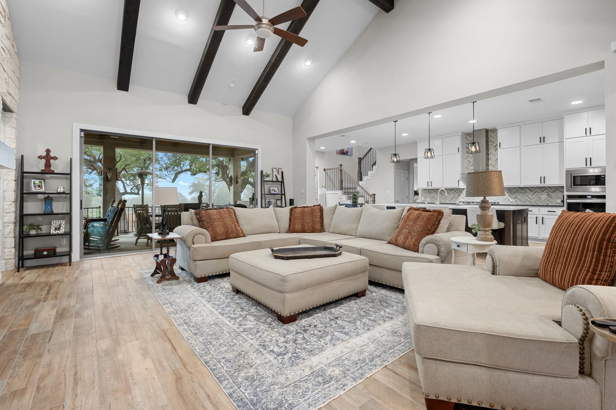 2009 Nature View Loop Driftwood, TX 78619 - Photo 6 of 40 a living room with furniture and a large window