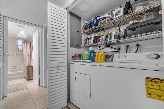 a bathroom with a toilet a sink and a shower