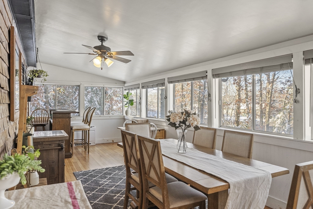 70 7 Hills Road Plymouth, MA 02360 - Photo 13 of 42 a view of a dining room with furniture window and outside view
