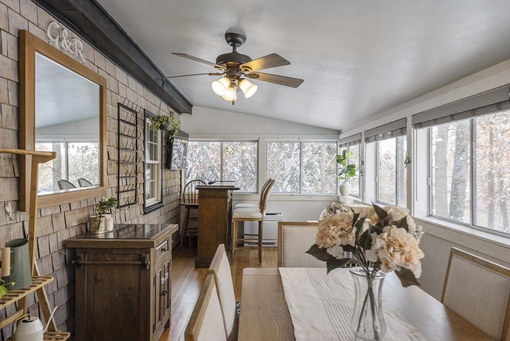 70 7 Hills Road Plymouth, MA 02360 - Photo 15 of 42 a view of a dining room with furniture window and outside view