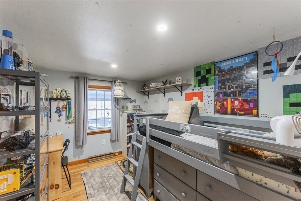 70 7 Hills Road Plymouth, MA 02360 - Photo 24 of 42 a living room with furniture and a flat screen tv