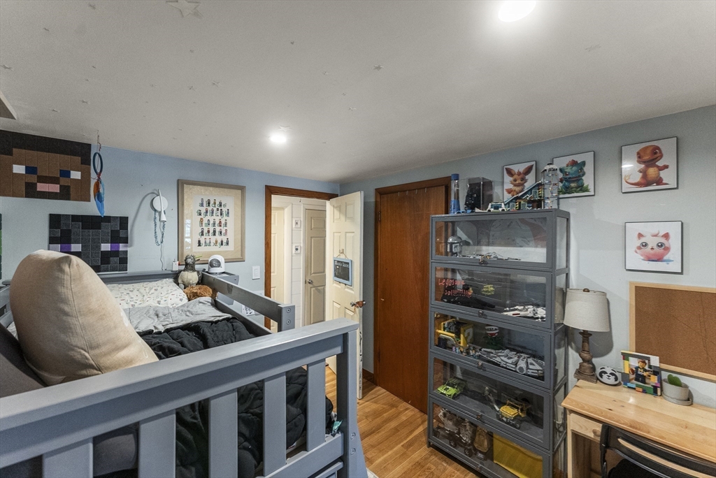 70 7 Hills Road Plymouth, MA 02360 - Photo 25 of 42 a living room with furniture and a flat screen tv