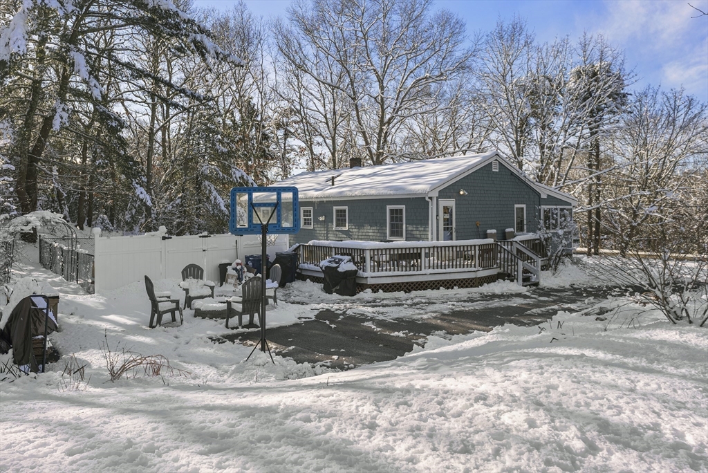 70 7 Hills Road Plymouth, MA 02360 - Photo 38 of 42 a view of a house with a yard covered in snow