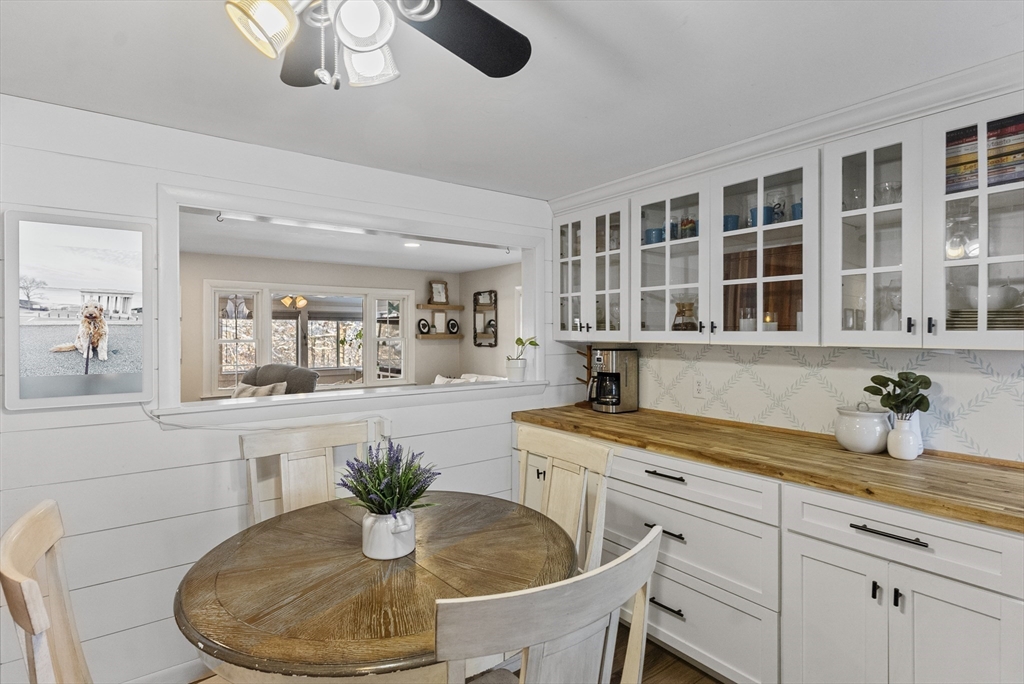 70 7 Hills Road Plymouth, MA 02360 - Photo 4 of 42 a kitchen with a table and chairs