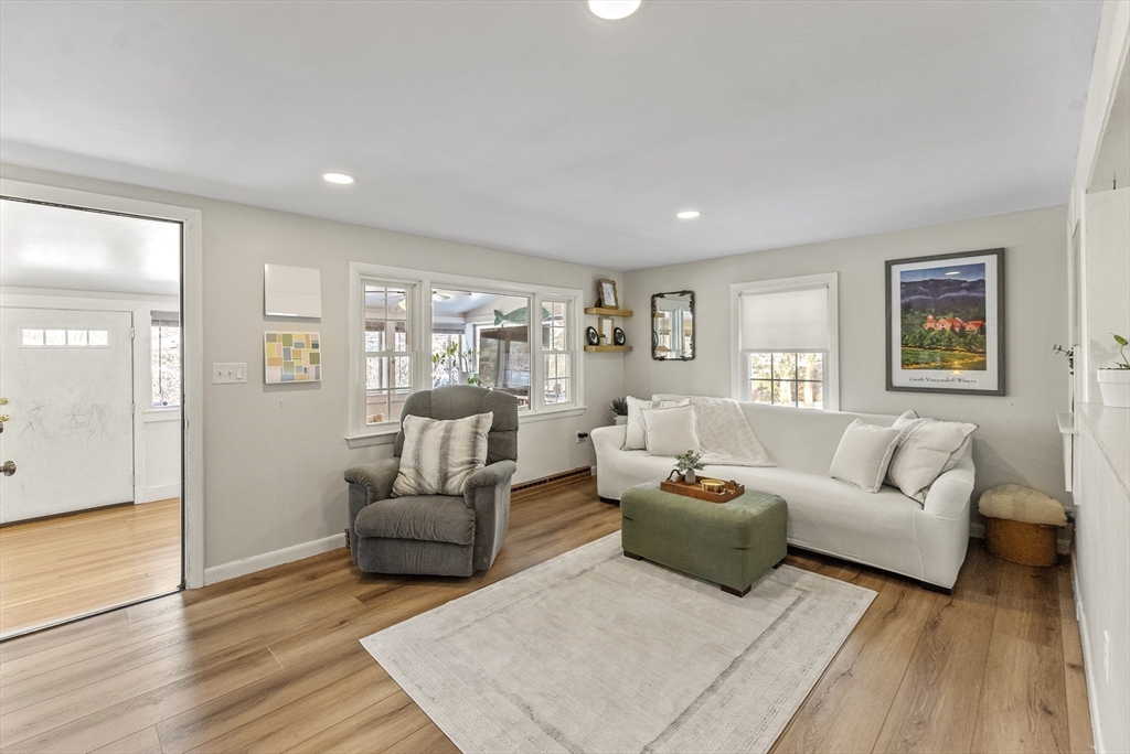 70 7 Hills Road Plymouth, MA 02360 - Photo 9 of 42 a living room with furniture and a wooden floor