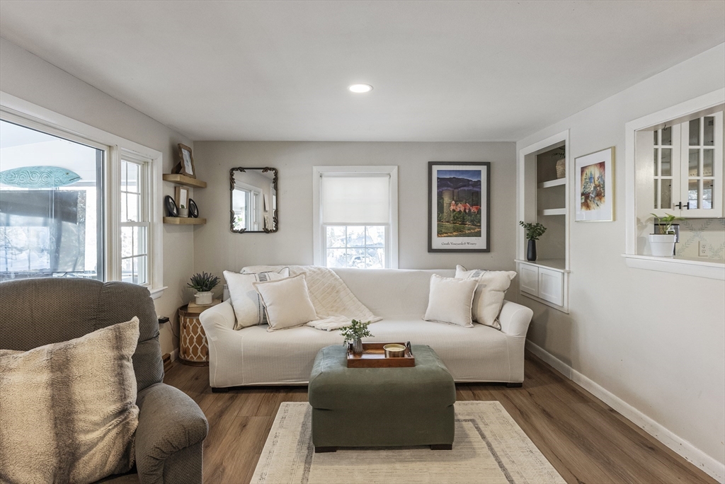 70 7 Hills Road Plymouth, MA 02360 - Photo 10 of 42 a living room with furniture and a window