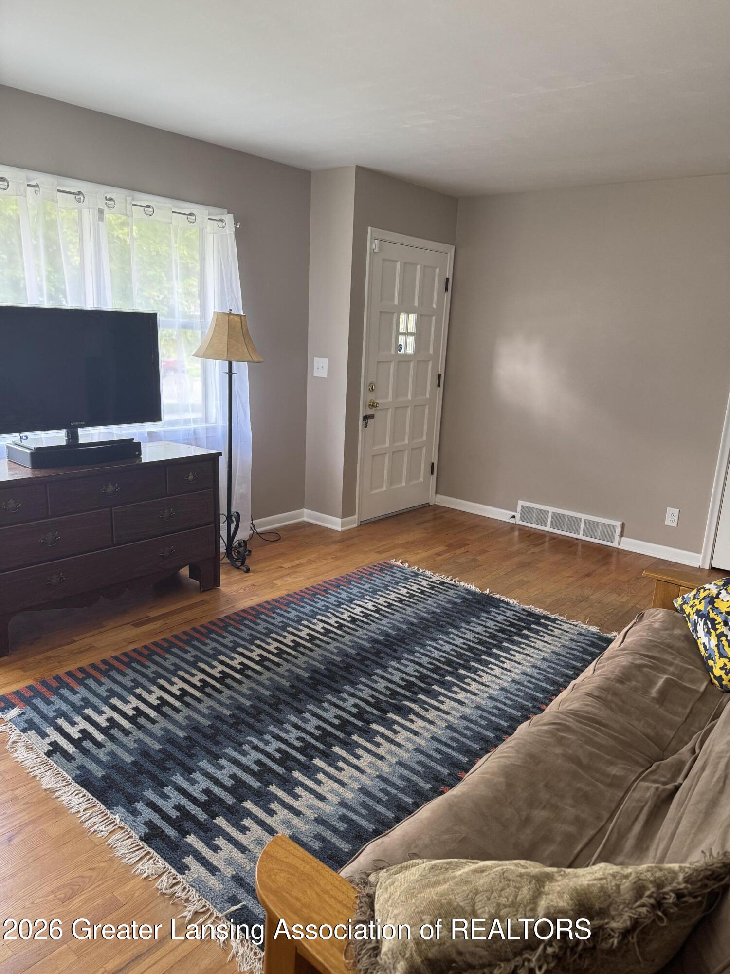 4901 Alpha Street Lansing, MI 48910 - Photo 9 of 34 Living Room 2