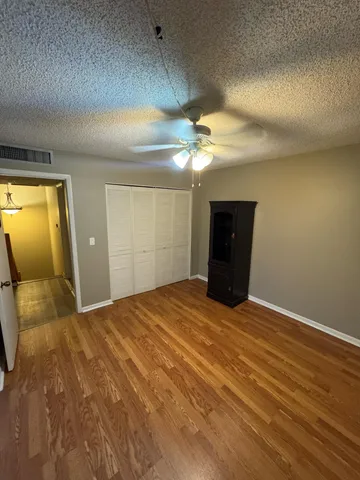 a view of a livingroom with a furniture
