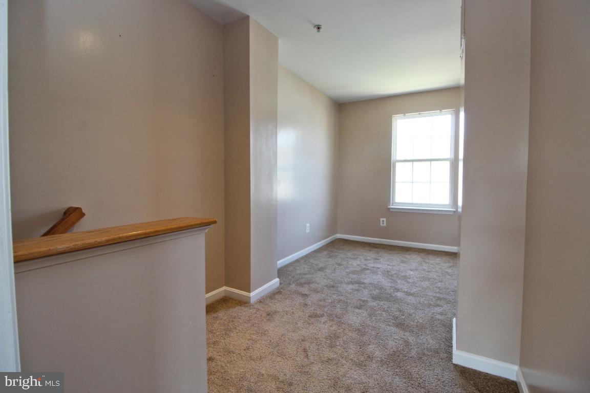 656 Luthardt Road Baltimore, MD 21220 - Photo 21 of 27 a view of a livingroom with a window