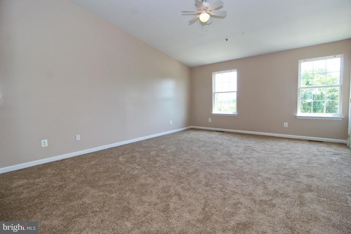656 Luthardt Road Baltimore, MD 21220 - Photo 24 of 27 an empty room with a window