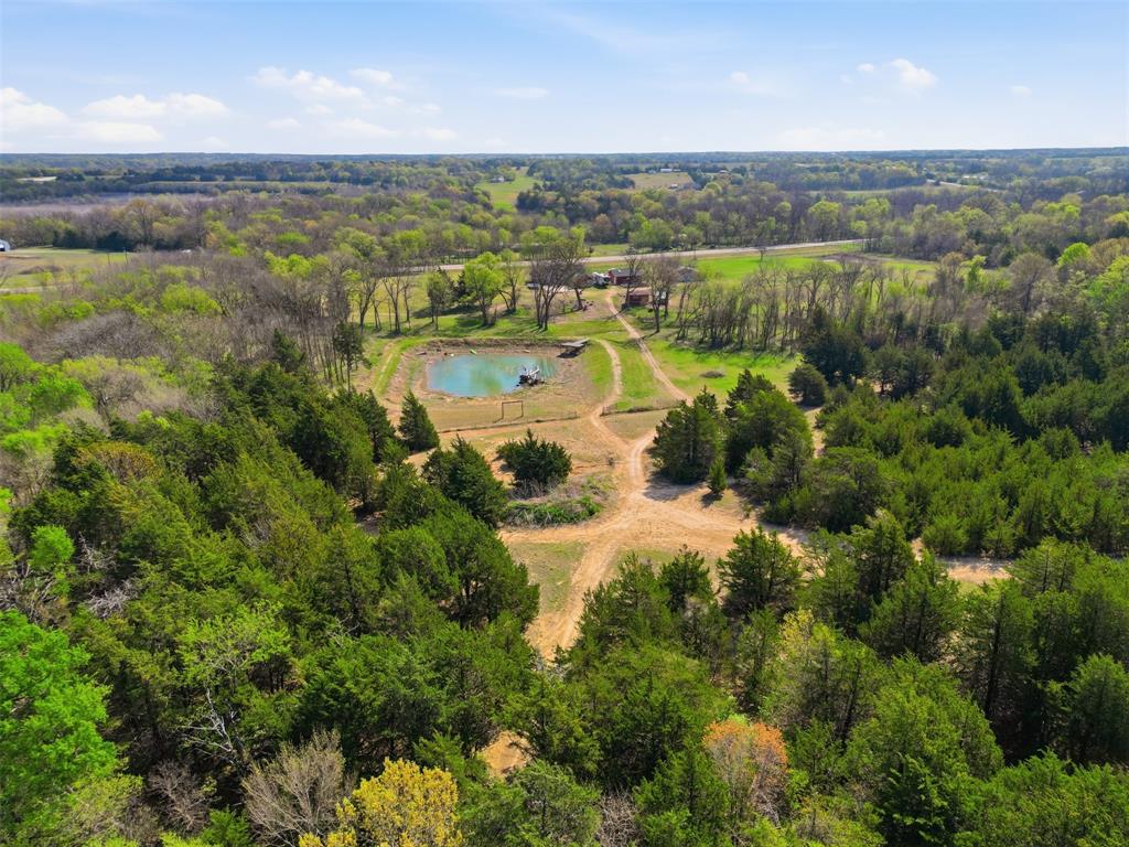 3823 State Highway Bonham, TX 75418 - Photo 32 of 37 an aerial view of residential houses with outdoor space and river