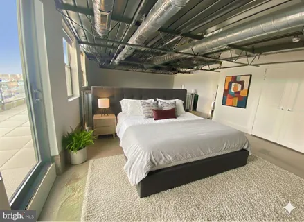 a refrigerator freezer sitting inside of a room