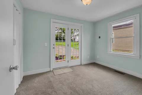 an empty room with windows