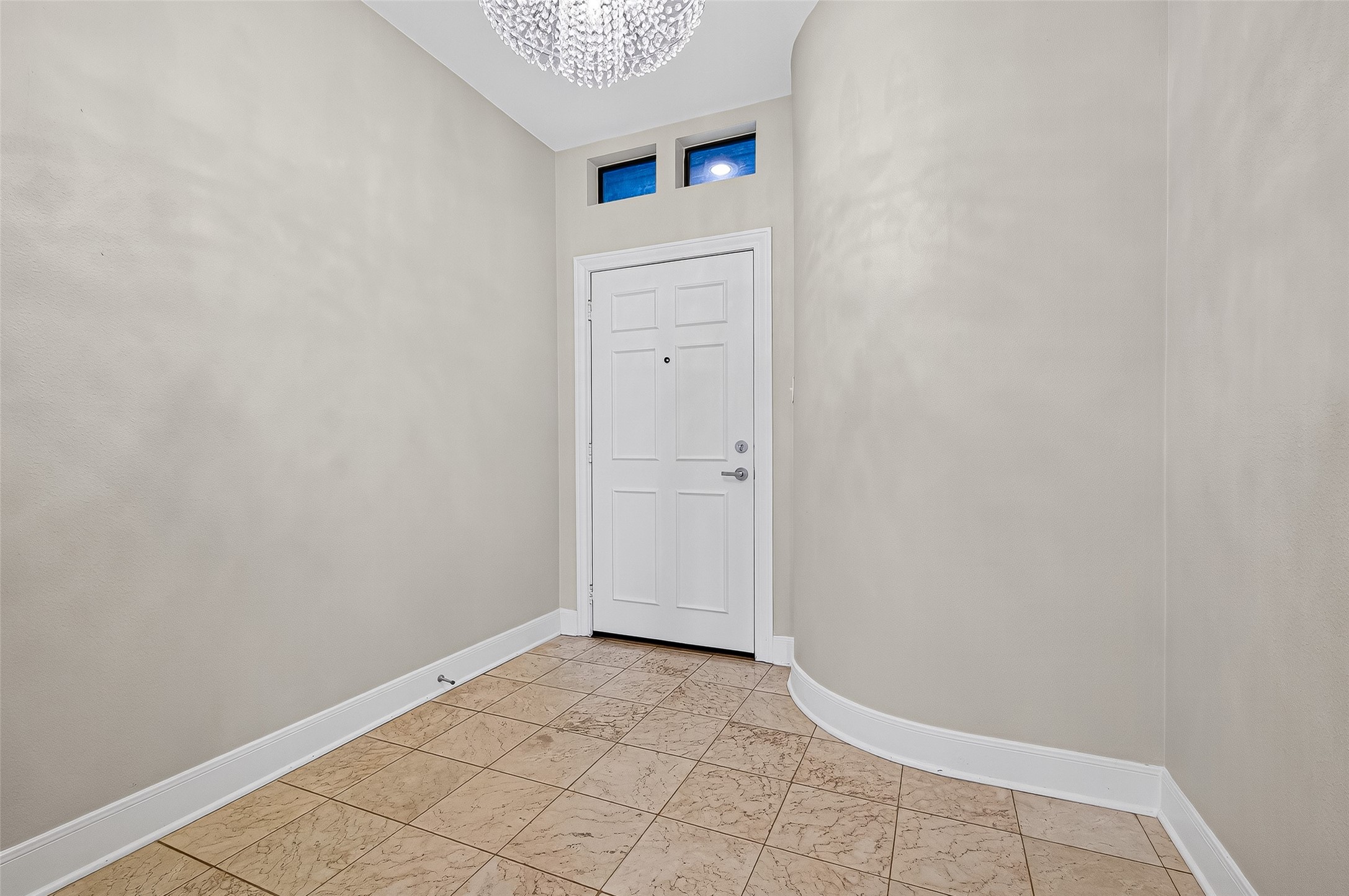 3027 Bissonnet Street Houston, TX 77005 - Photo 4 of 47 Bright, open foyer with marble tile — a clean, fresh start to every room in the house