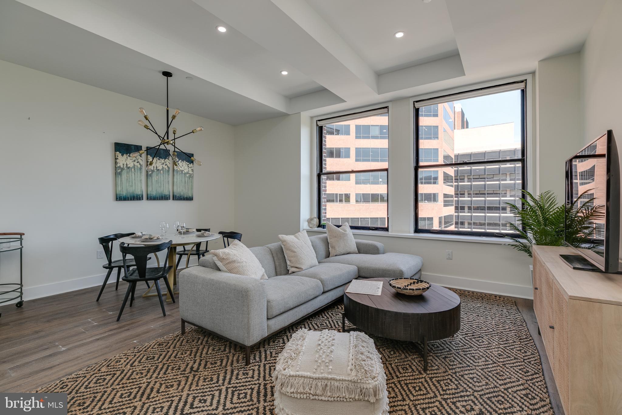 150 South Independence Mall West, Unit 403 Philadelphia, PA 19106 - Photo 13 of 19 a living room with furniture and a window