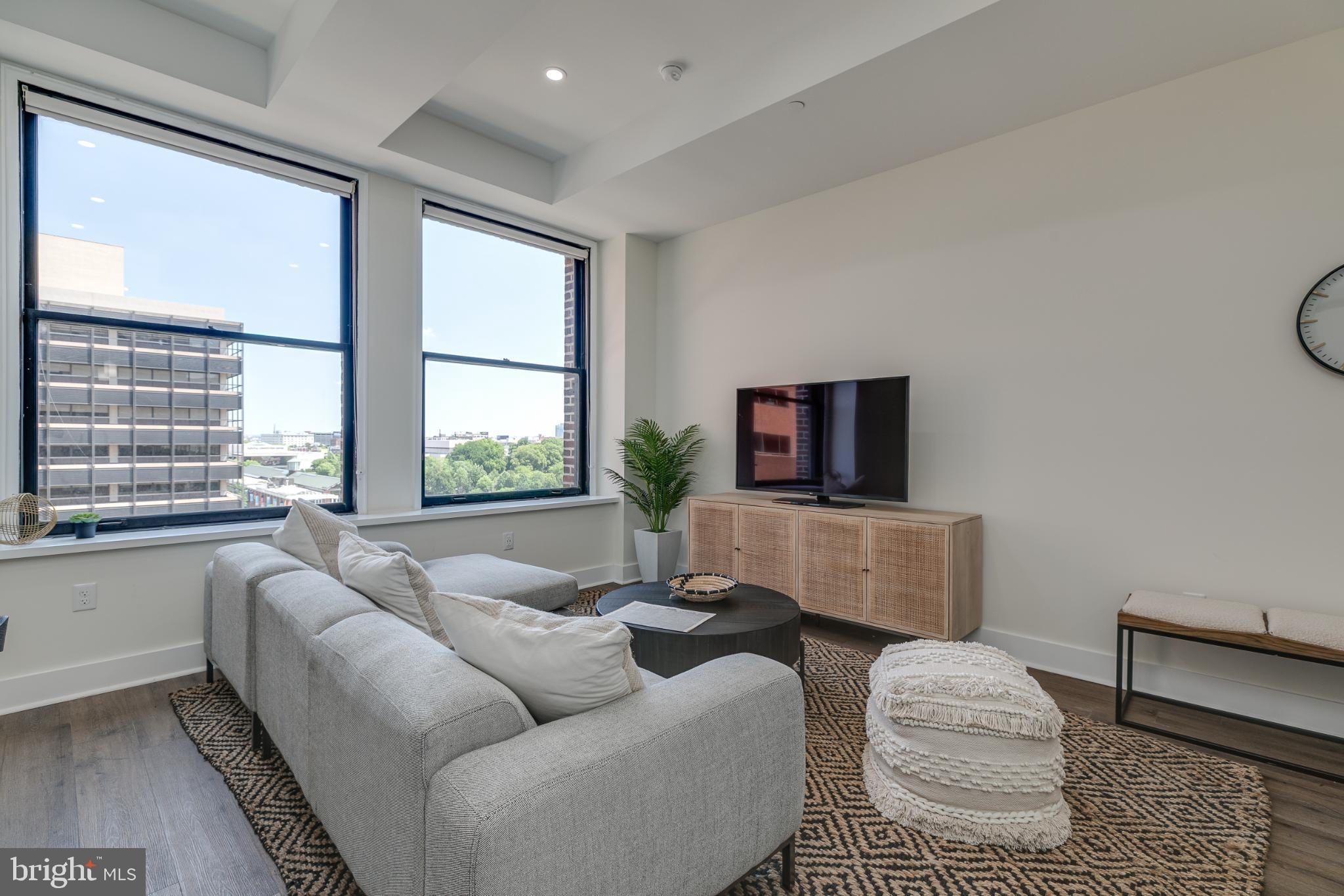 150 South Independence Mall West, Unit 403 Philadelphia, PA 19106 - Photo 6 of 19 a living room with furniture and a window