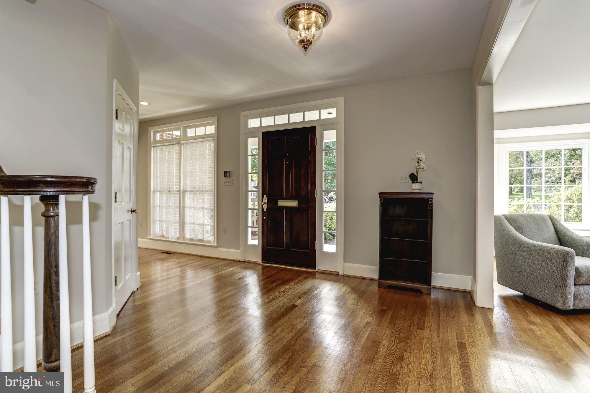 4105 Everett Street Kensington, MD 20895 - Photo 4 of 30 wooden floor in an empty room with a window