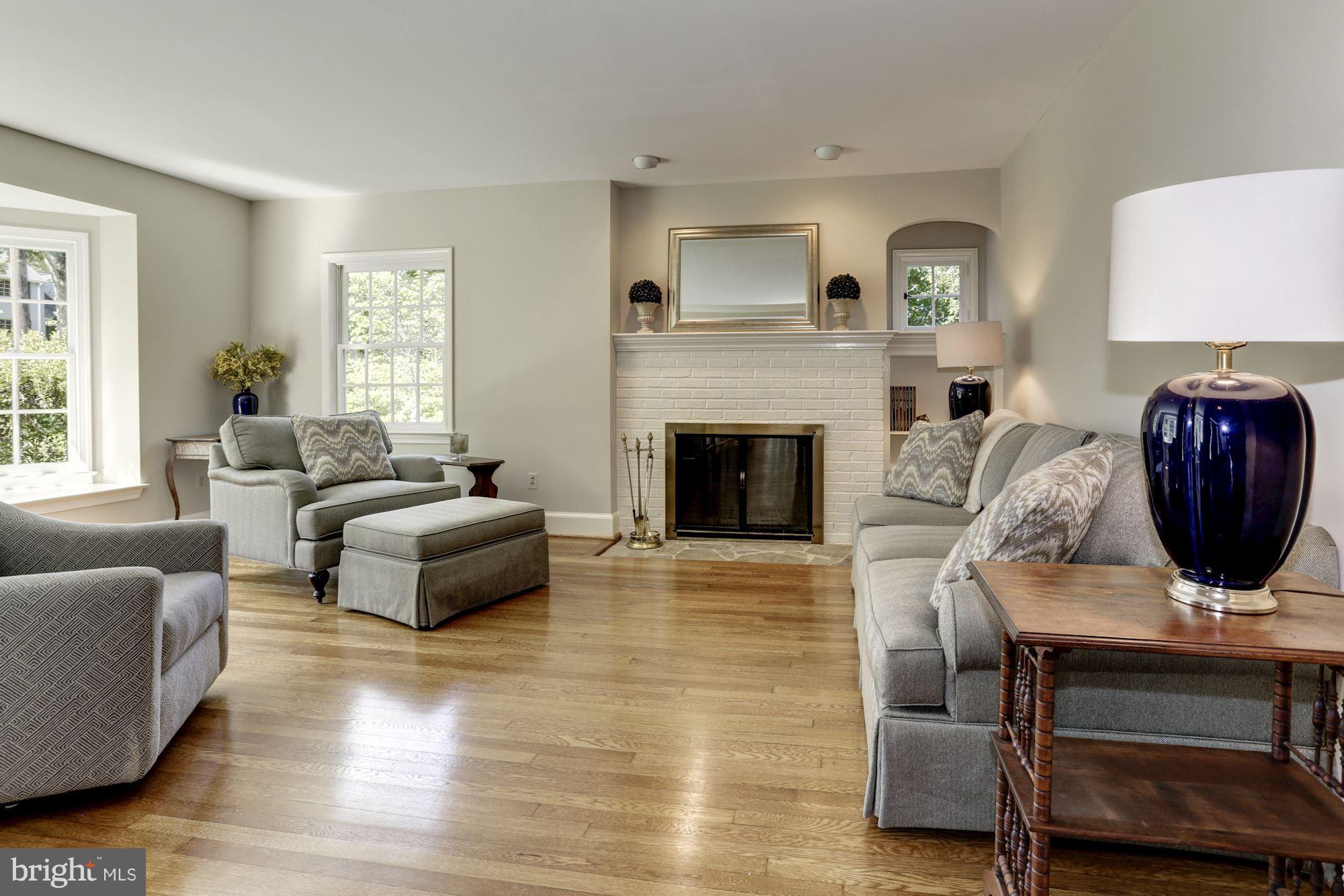 4105 Everett Street Kensington, MD 20895 - Photo 5 of 30 a living room with furniture and a fireplace