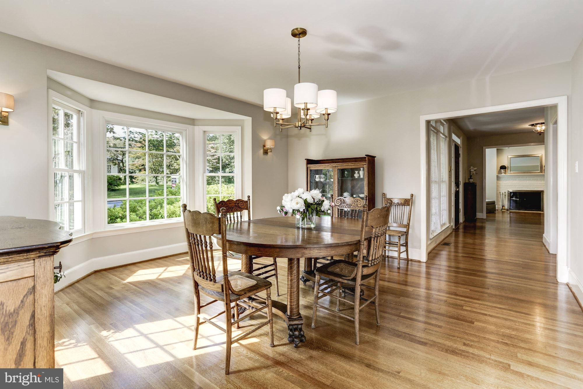 4105 Everett Street Kensington, MD 20895 - Photo 7 of 30 a view of a dining room with furniture window and wooden floor