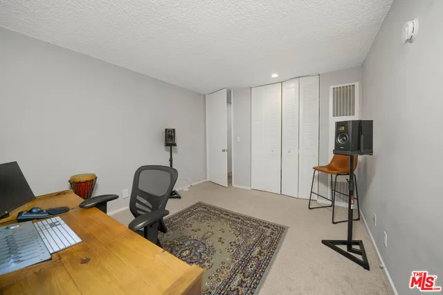 a room with two chairs and a table