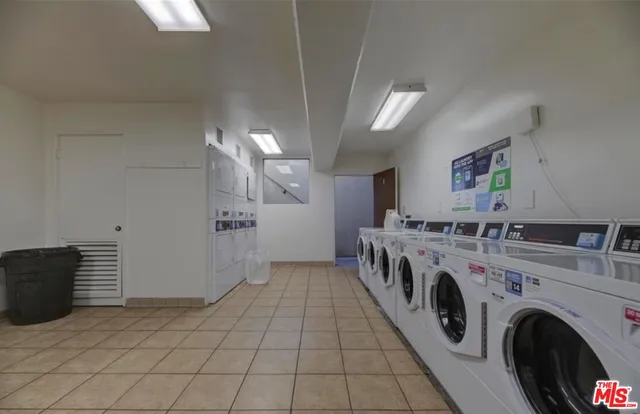 a view of a storage & utility room with washer and dryer