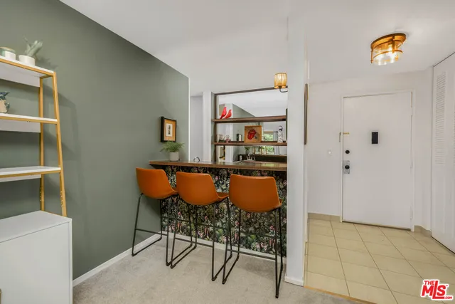 a room with a table and chairs