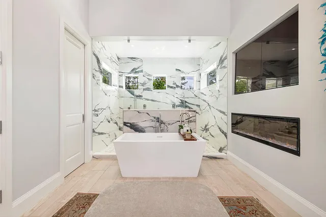 a view of living room with furniture and flat screen tv