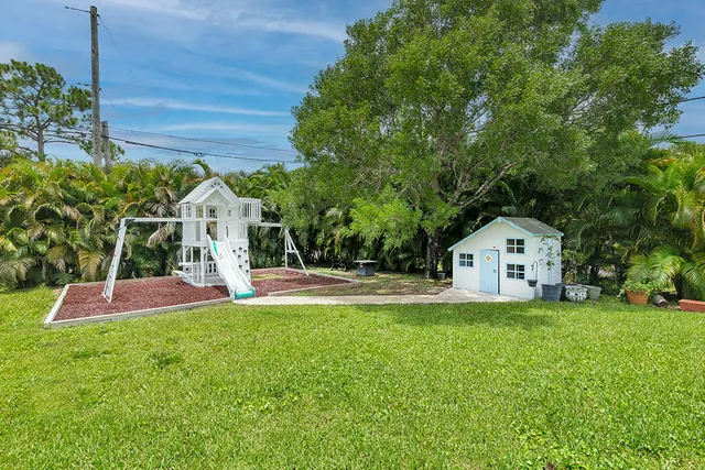 a house view with a garden space