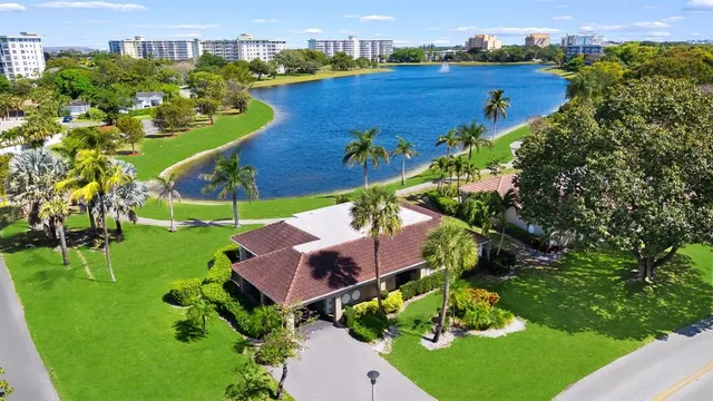 an aerial view of a house with a garden