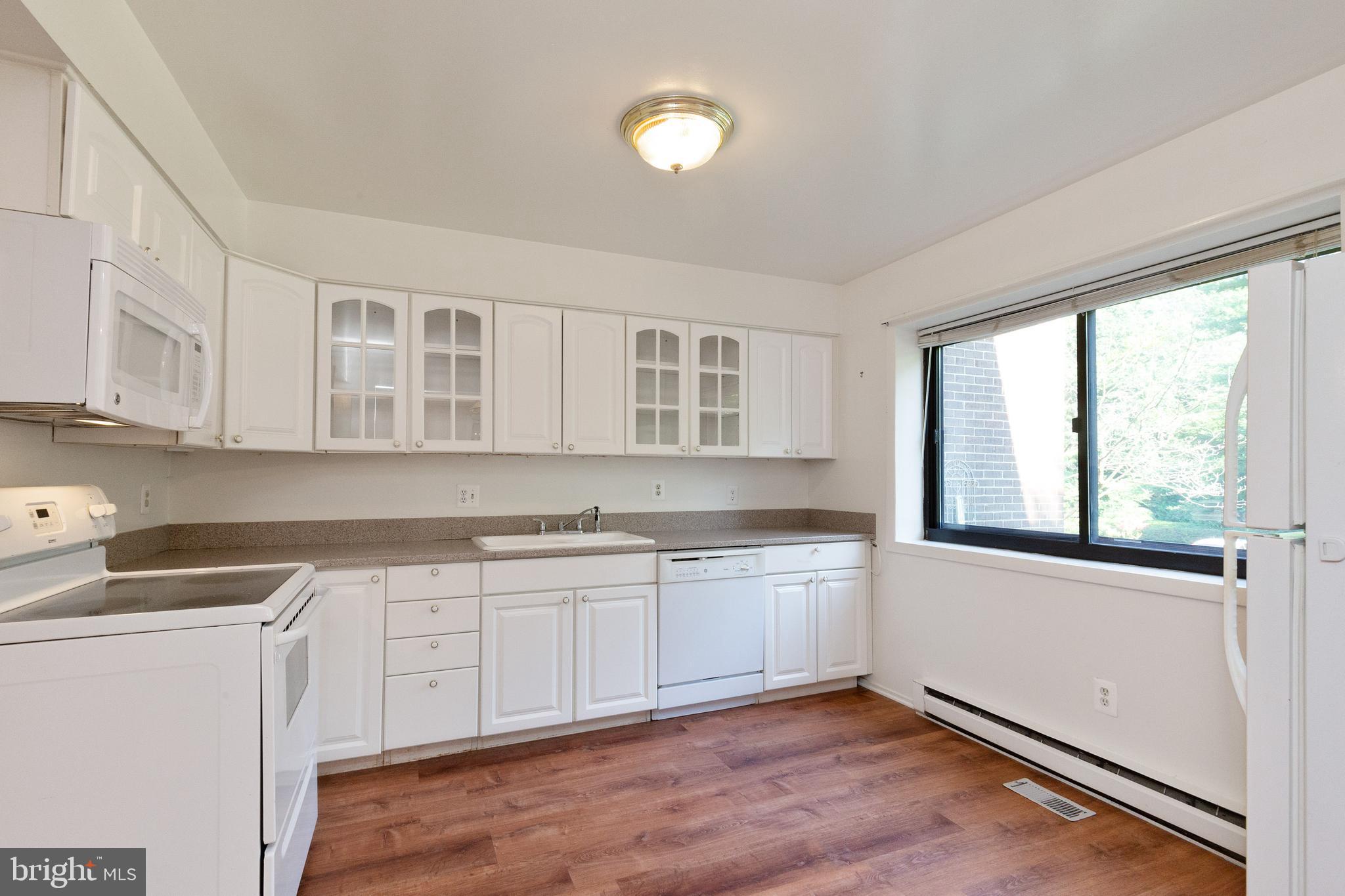 2115 Glencourse Lane Reston, VA 20191 - Photo 17 of 42 Kitchen with new wood floor