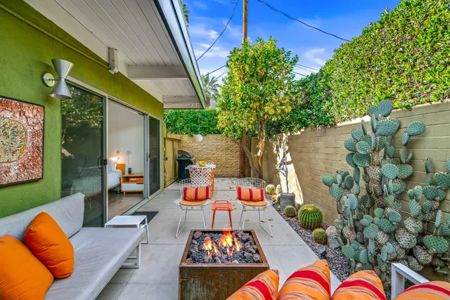 a view of a patio with swimming pool
