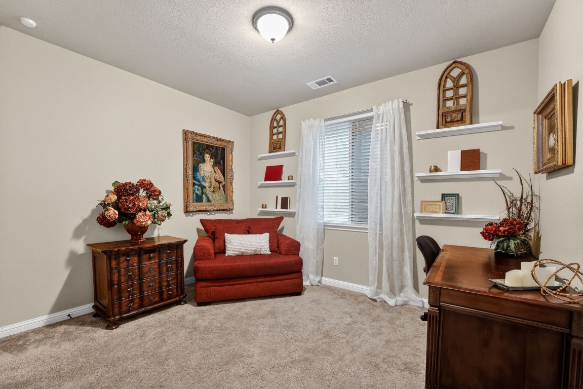 4521 Pyrenees Pass Bee Cave, TX 78738 - Photo 16 of 22 a living room with furniture