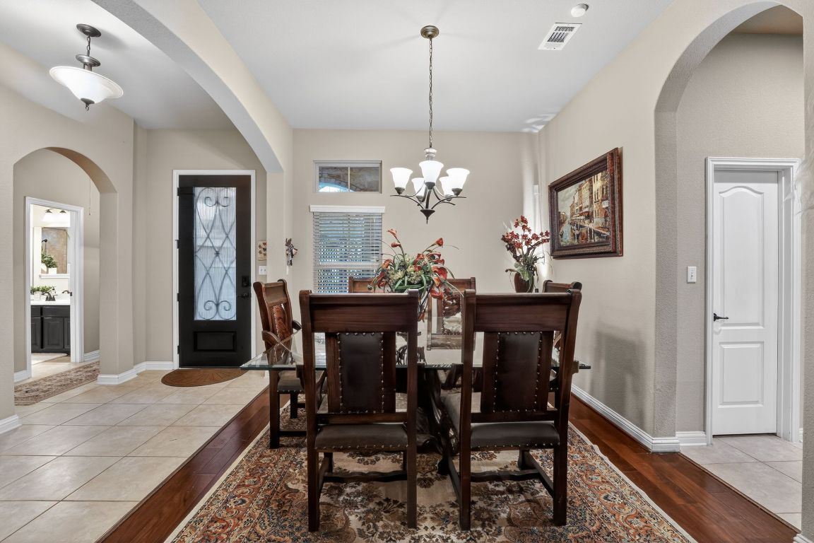 4521 Pyrenees Pass Bee Cave, TX 78738 - Photo 6 of 22 a dining room with furniture and window