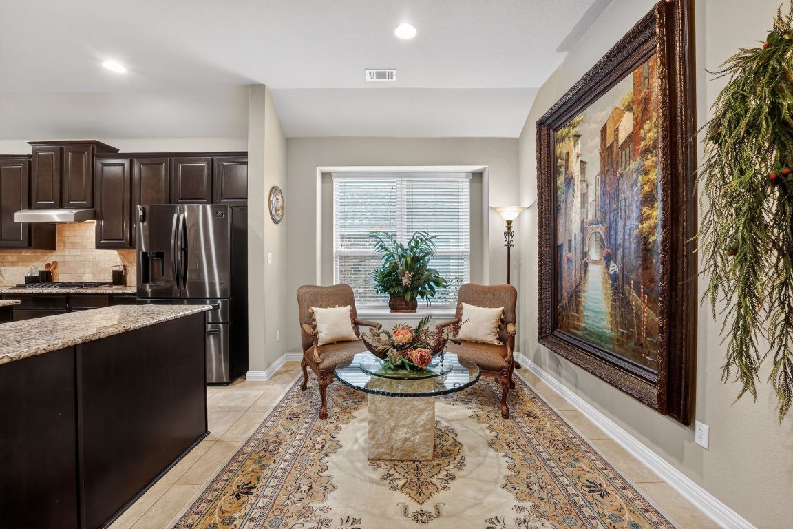 4521 Pyrenees Pass Bee Cave, TX 78738 - Photo 9 of 22 a living room with large window and furniture