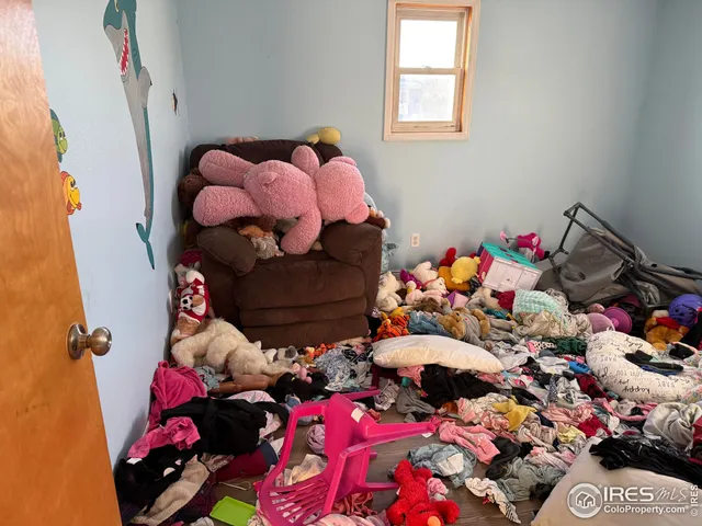 a view of a house with yard and sitting area