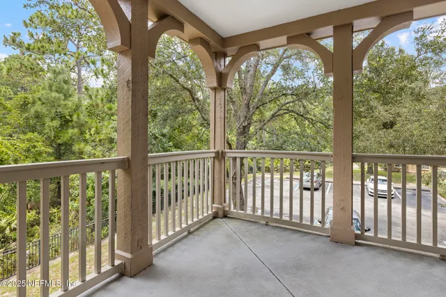 a view of a porch with a yard