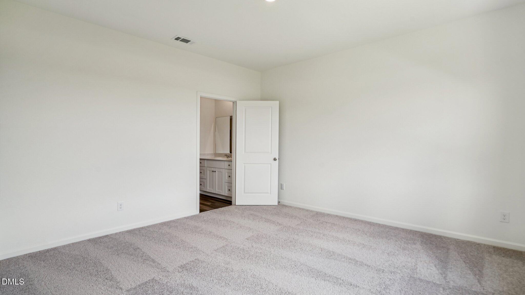 1304 Solace Way Rolesville, NC 27571 - Photo 15 of 34 a view of an empty room