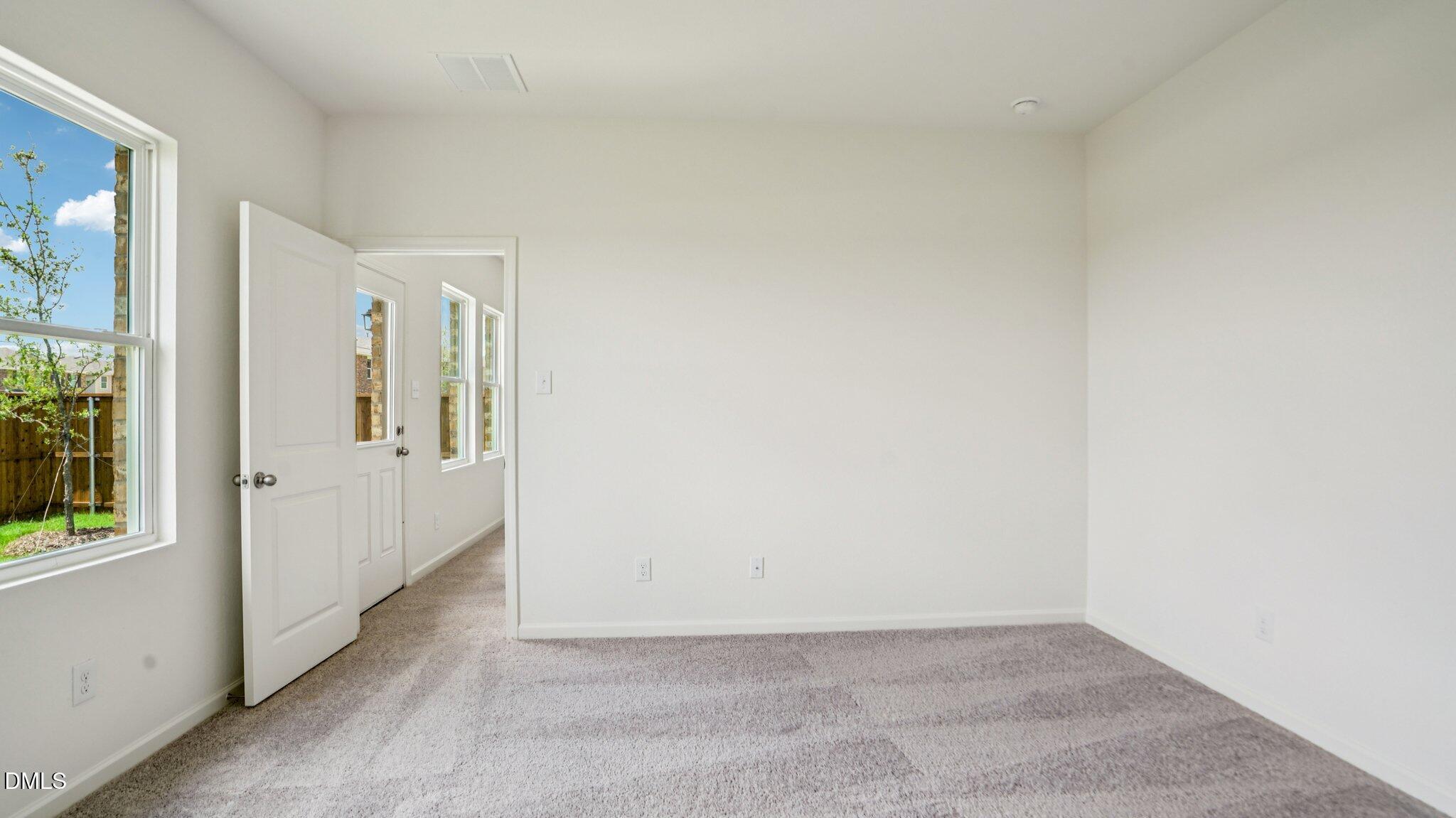 1304 Solace Way Rolesville, NC 27571 - Photo 18 of 34 a view of an empty room