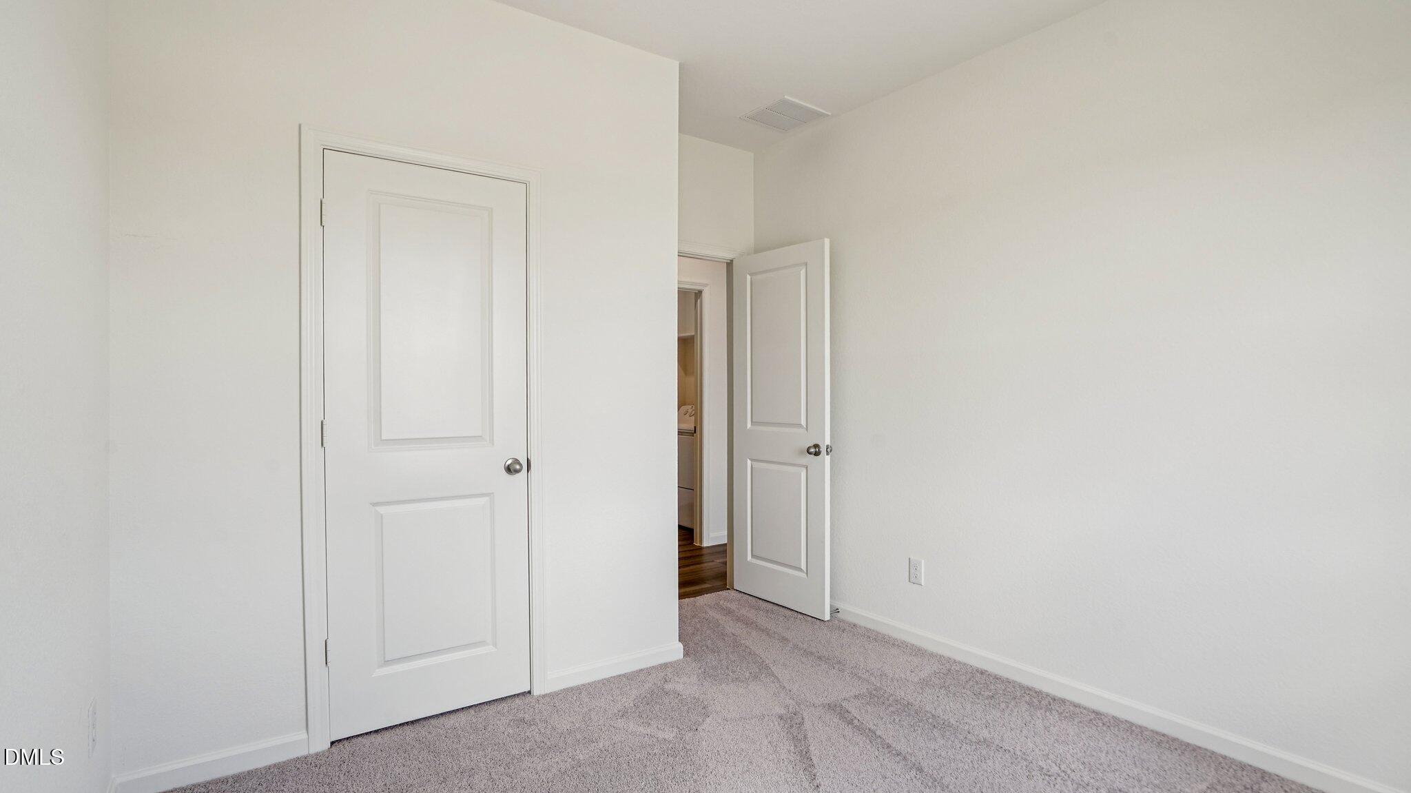1304 Solace Way Rolesville, NC 27571 - Photo 24 of 34 a view of an empty room