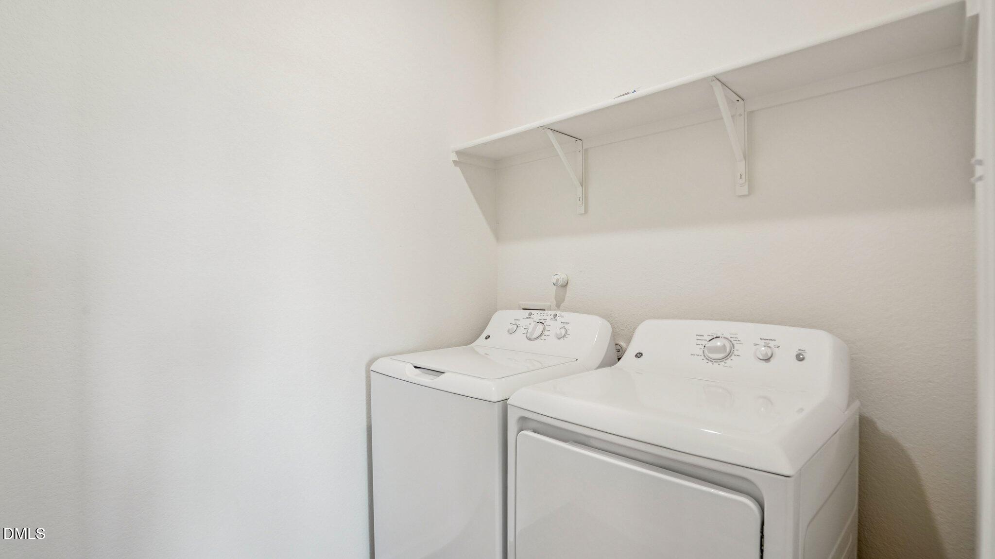 1304 Solace Way Rolesville, NC 27571 - Photo 25 of 34 a utility room with dryer and washer