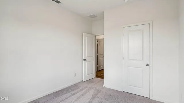 a bathroom with a sink toilet tub vanity and shower