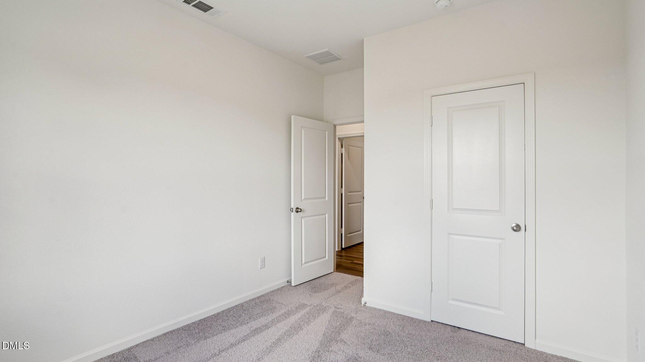 1304 Solace Way Rolesville, NC 27571 - Photo 26 of 34 a view of an empty room