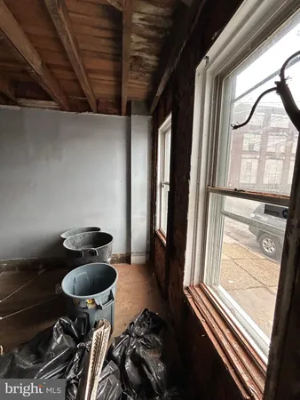 a room with lots of wooden furniture