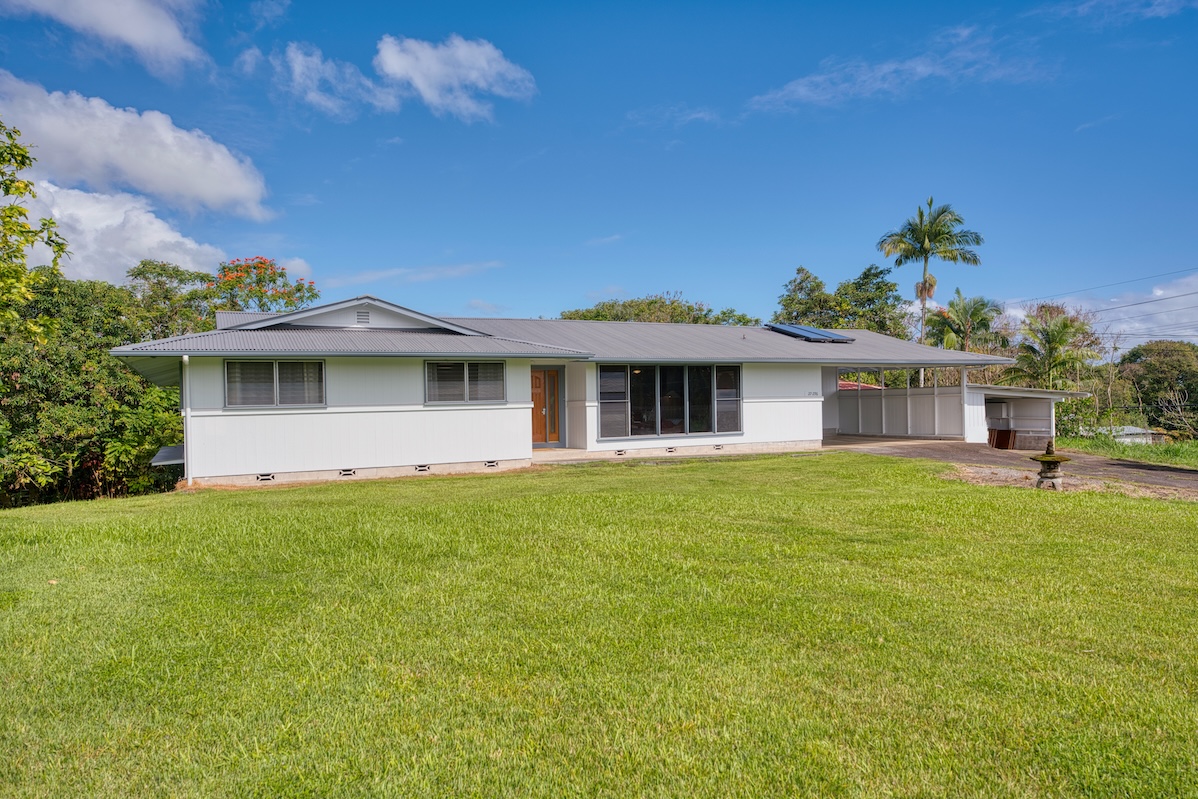 27-296 Ka'ie'ie Road Papaikou, HI 96781 - Photo 28 of 28 a view of a house with a backyard