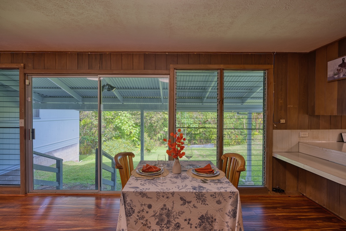 27-296 Ka'ie'ie Road Papaikou, HI 96781 - Photo 8 of 28 a sitting area with furniture and window