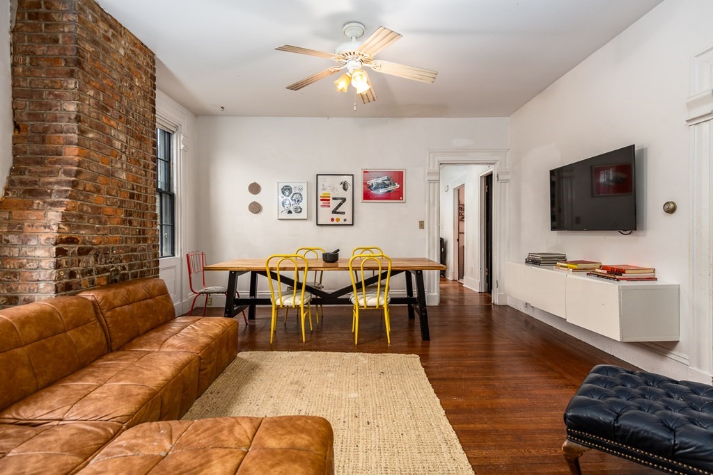 206 Smith Street Providence, RI 02908 - Photo 24 of 40 a living room with furniture and a flat screen tv