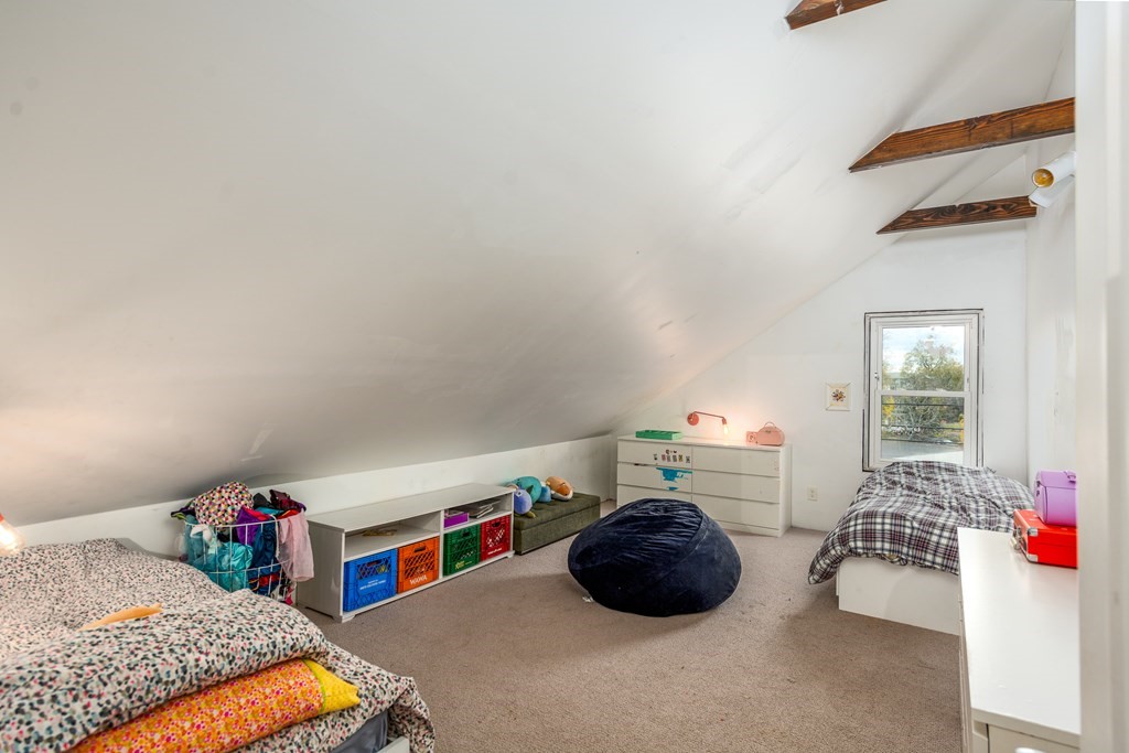 206 Smith Street Providence, RI 02908 - Photo 37 of 40 a bedroom with a bed and a window