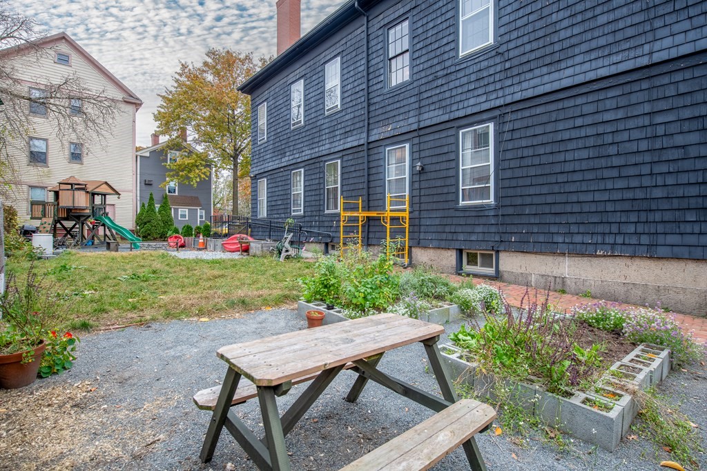 206 Smith Street Providence, RI 02908 - Photo 4 of 40 a backyard of a house with lots of green space